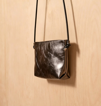Metallischer Umhängetasche mit Armband und verstellbarem Gurt